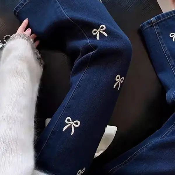 Bow embroidered micro-pull jeans 2026 new slim-fitting and thin casual versatile lazy nine-point pants elastic waist
