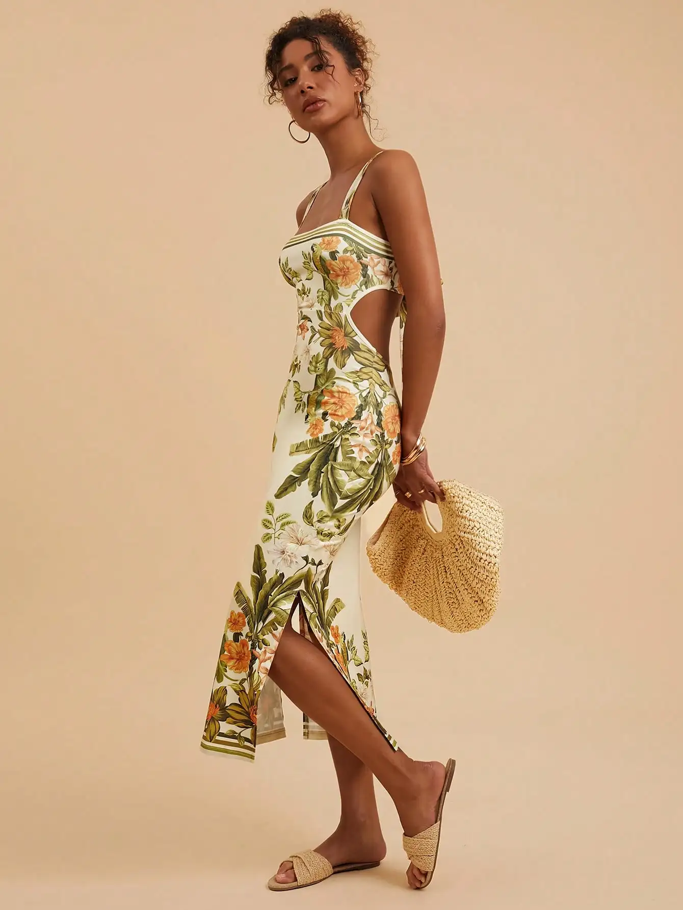 

Платье миди с цветочным принтом, вырезами по бокам и тонкими бретелями