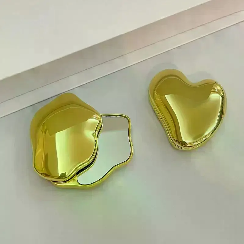 Espejo de maquillaje con forma de corazón de doble cara para niña, espejo pequeño y bonito, espejo giratorio portátil para estudiantes, herramientas cosméticas de belleza de mano