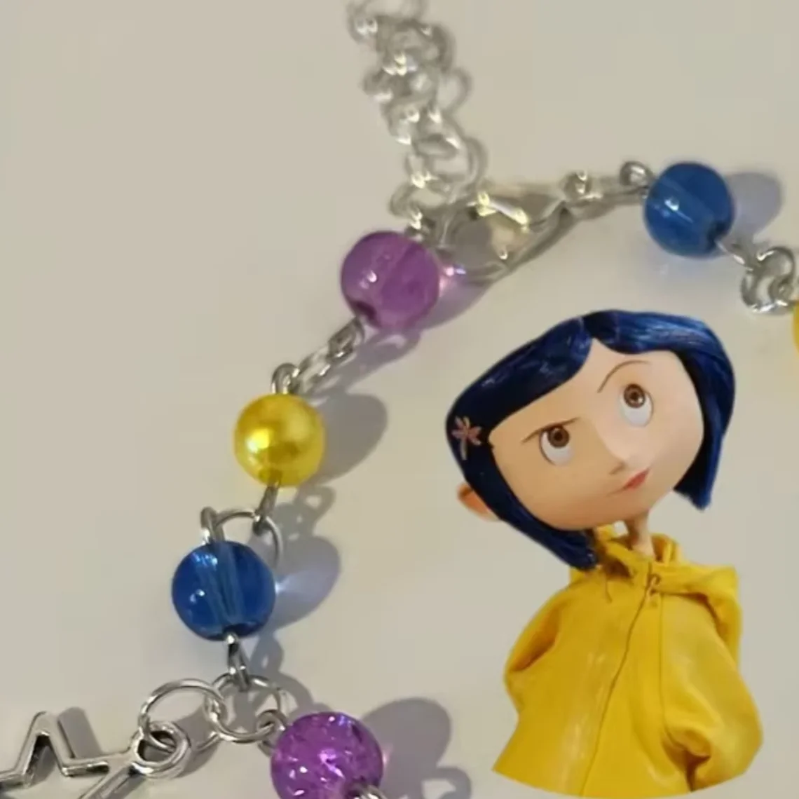 handmade coraline and wybie matching charm bracelets
