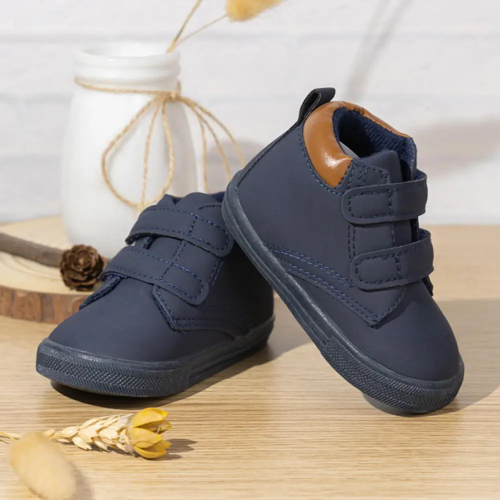 Stivali Martin per bambini alti in tinta unita suola in gomma calda scarpe Casual scarpe da ginnastica per bambini antiscivolo stivali per ragazze