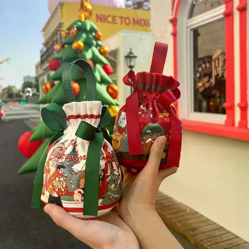 Bolsa de Nochebuena con manzana de caramelo; Saco de regalo de lona para llevar a mano; Bolsa de embalaje festivo.
