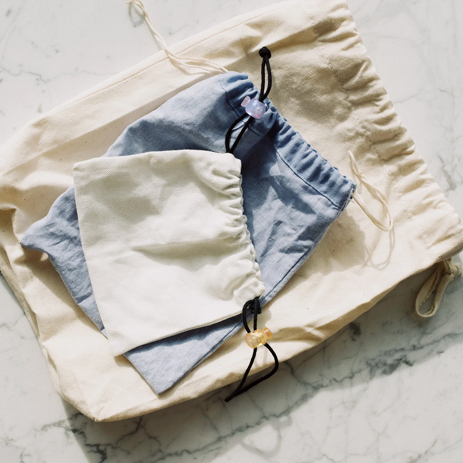 

100Pcs Cord Lock Spring Buckle Adjustable Tightening Buckle for Drawstrings Hooded Jackets Backpacks Sportswear