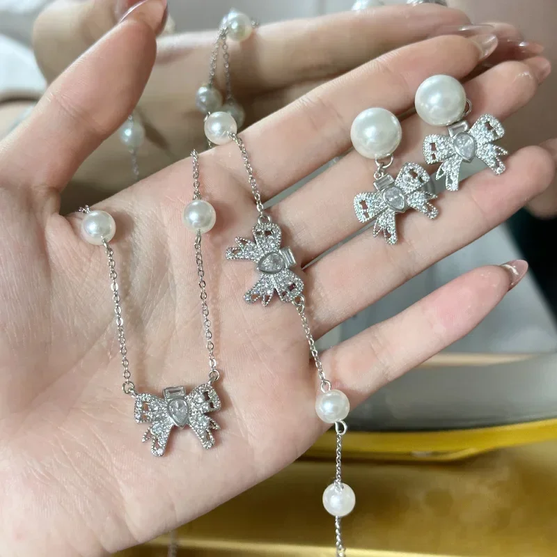

MDL Moissa!ite style high custom niche butterfly bracelet miu set plated 18k classic sweet and versatile pearl pendant