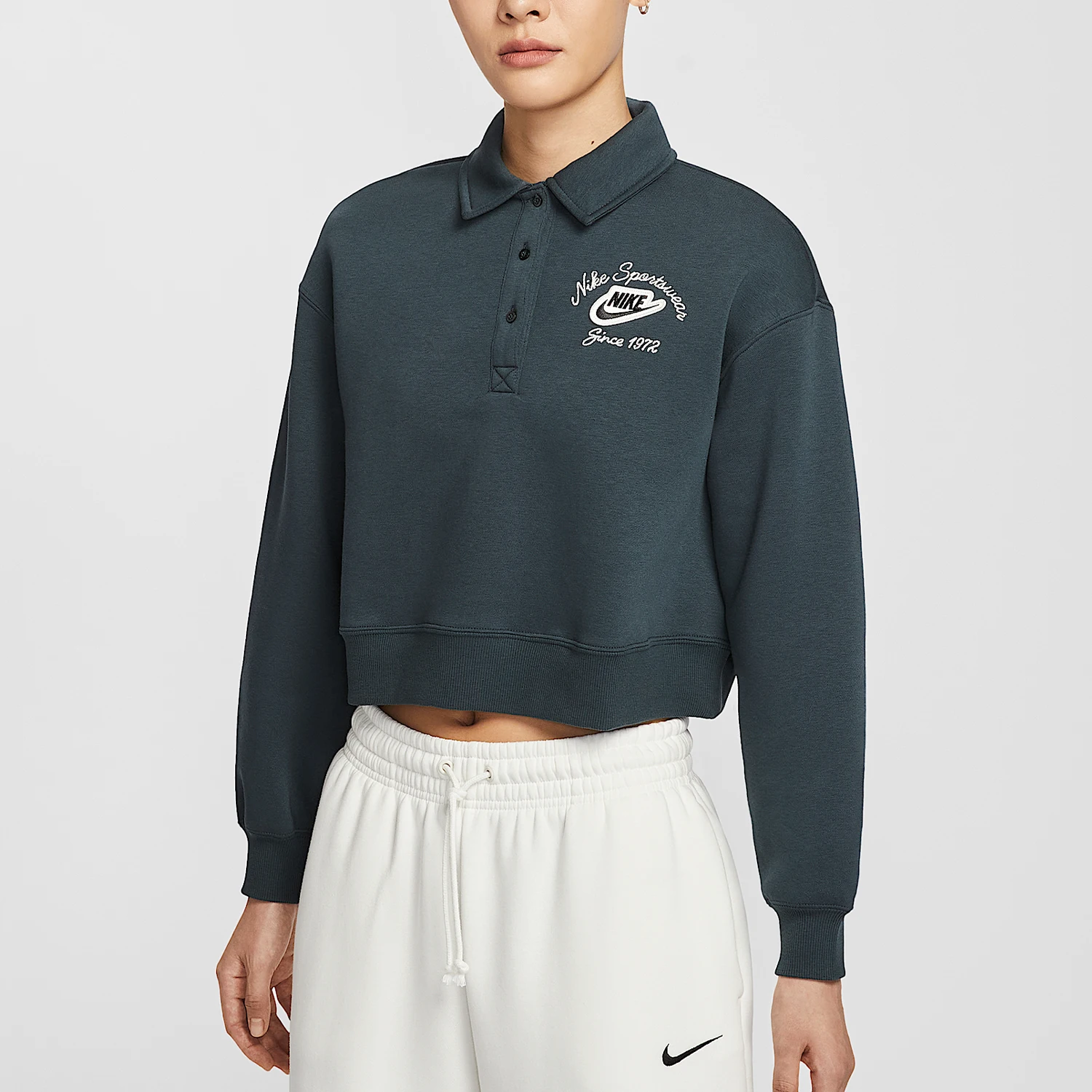 

Женский трикотажный свитер с воротником Nike Originals Sportswear IM7487-390