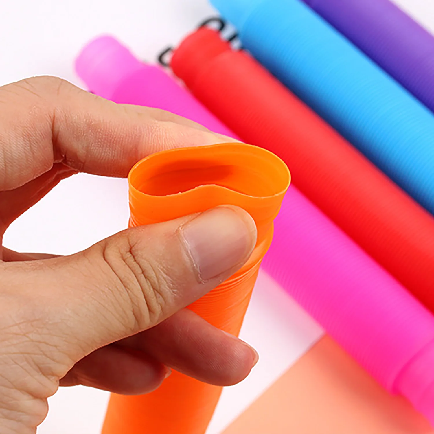 A stretchable tube that can relieve stress at all times, relaxing stress and bringing joy to oneself