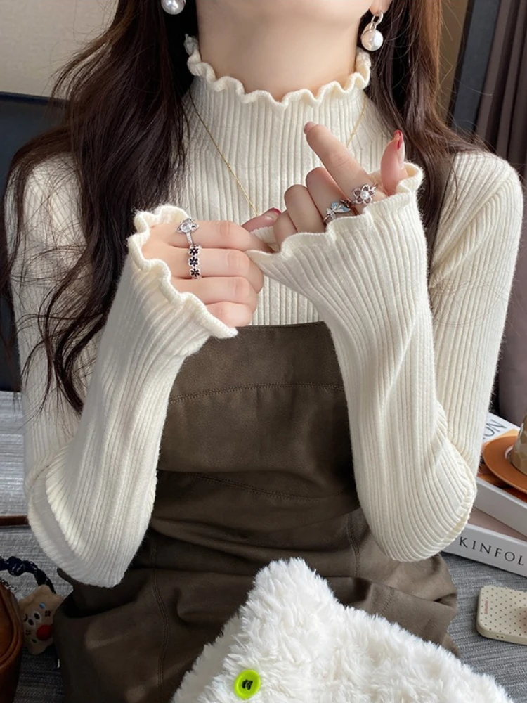 2025 Tops suaves de manga larga para mujer, jerséis de punto con cuello alto para otoño e invierno, suéter fruncido versátil informal, Top de capa Base delgada