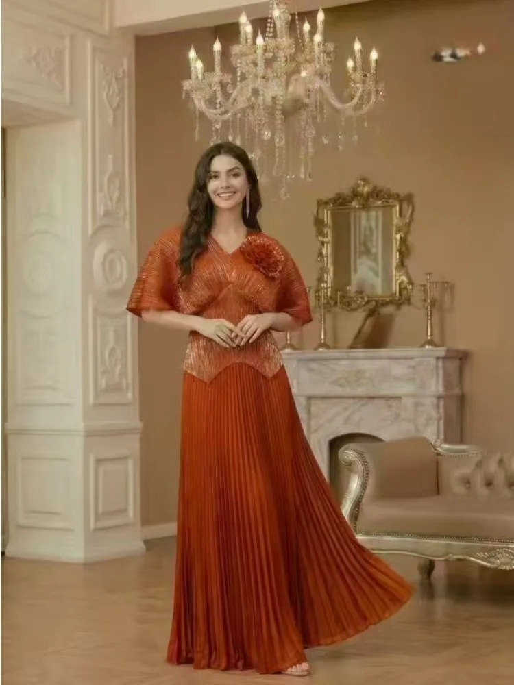 

Africa 2025 Autumn and Winter Miyake Pleated Print V-neck Bronzing Top Loose Pleated Skirt Two-piece Set Women's Clothing