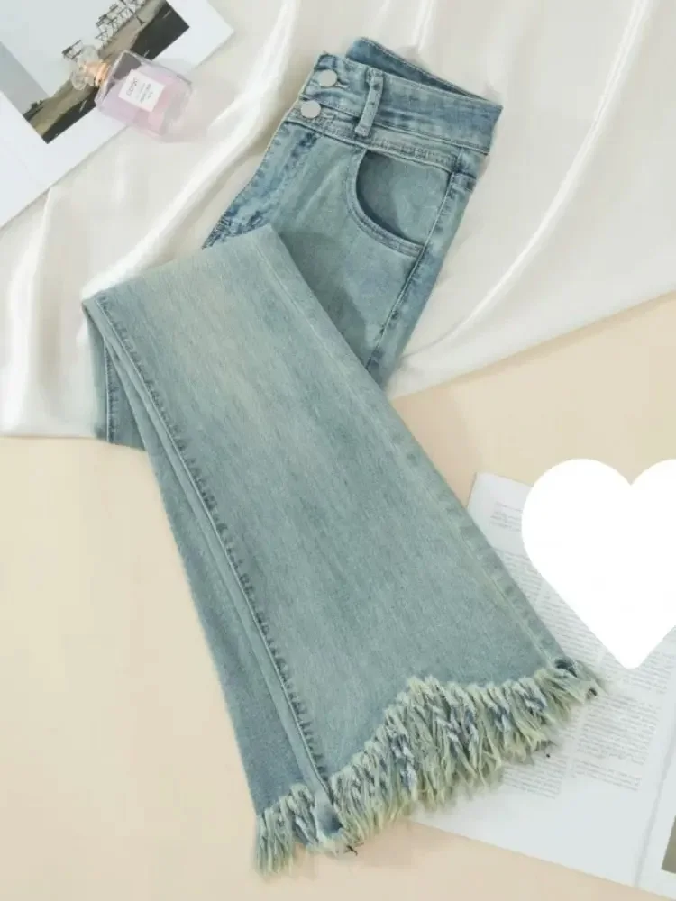 Wijde pijpen hoog getailleerde jeans met franjes dames casual Koreaanse mode slanke vaqueros knoppen vintage streetwear bootcut denim broek