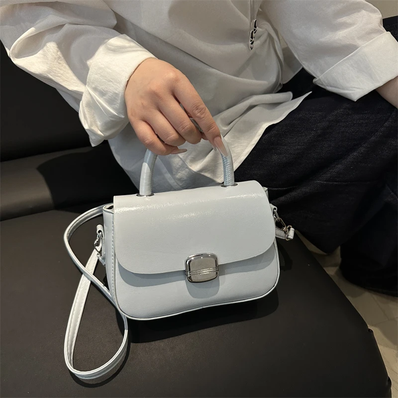 

Portable fashion high-end saddle bag 2025 new simple and versatile shoulder bag niche trendy women's bag