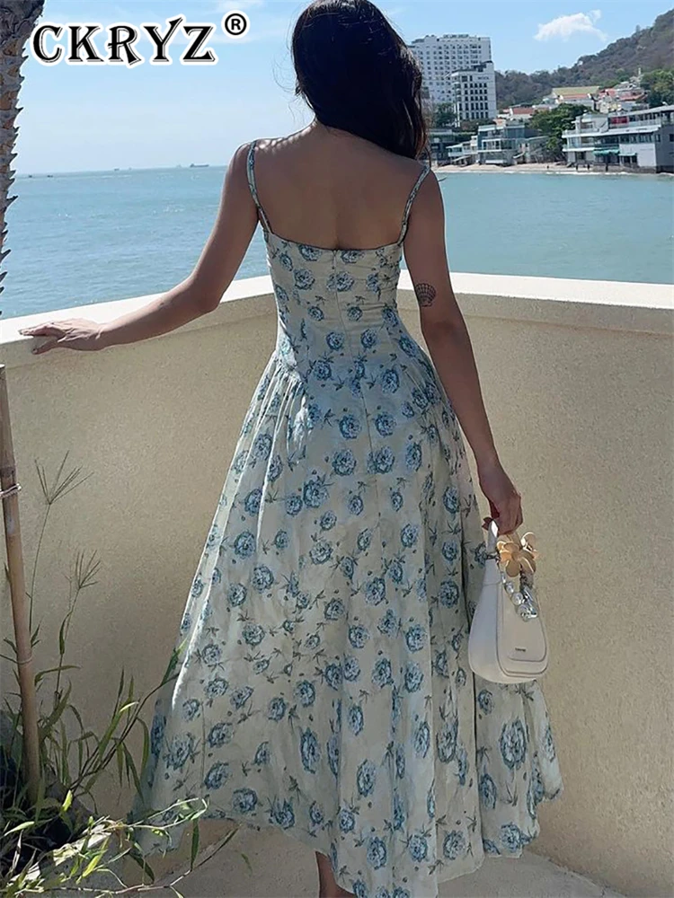 ชุดเดรสยาวลายดอกไม้สำหรับฤดูร้อน แฟชั่นใหม่สำหรับงานเลี้ยงกลางคืน ผู้หญิง แขนกุด เปิดหลัง เหมาะสำหรับวันหยุดพักผ่อน คลับ และสตรีทแวร์