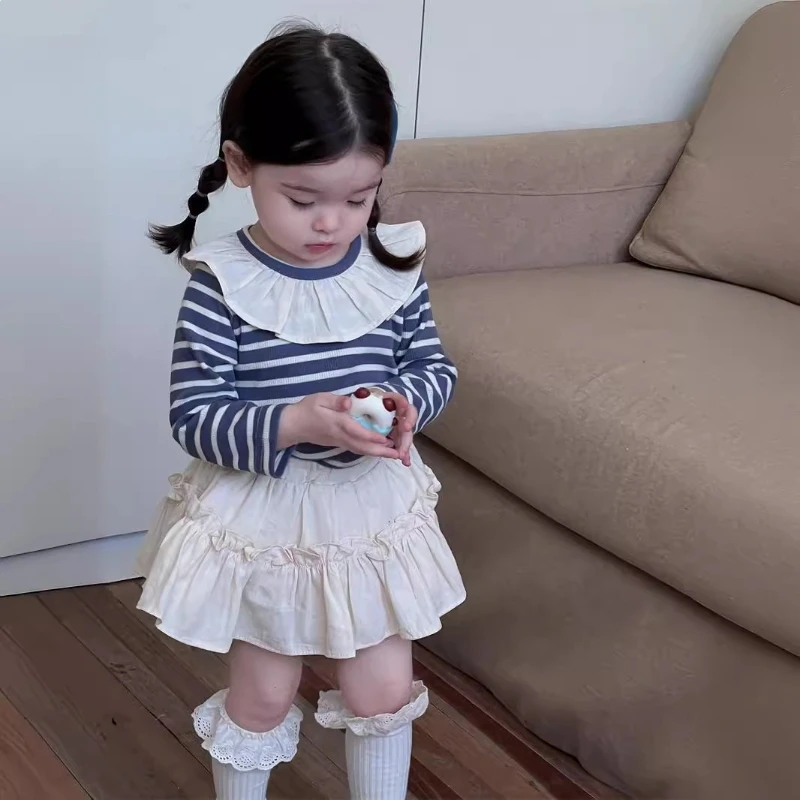 

2026 Spring/Summer New Hot Selling Simple Striped Long Sleeve Splicing Cotton Doll Neck Bottom Shirt for Children