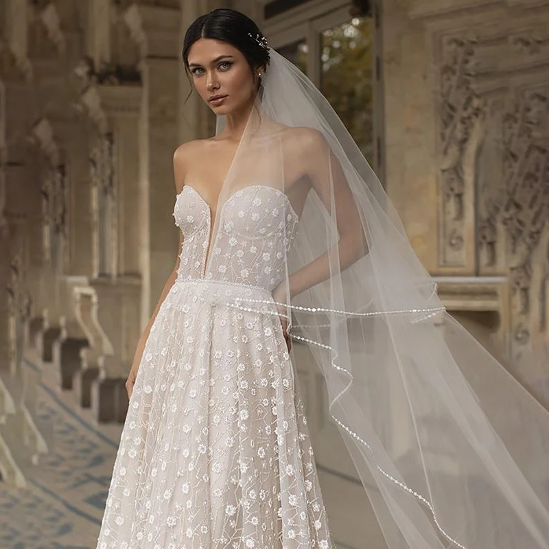 Vestido De novia elegante sin tirantes para mujer, traje De tul con Apliques De encaje, línea A, con cola De barrido, 2024