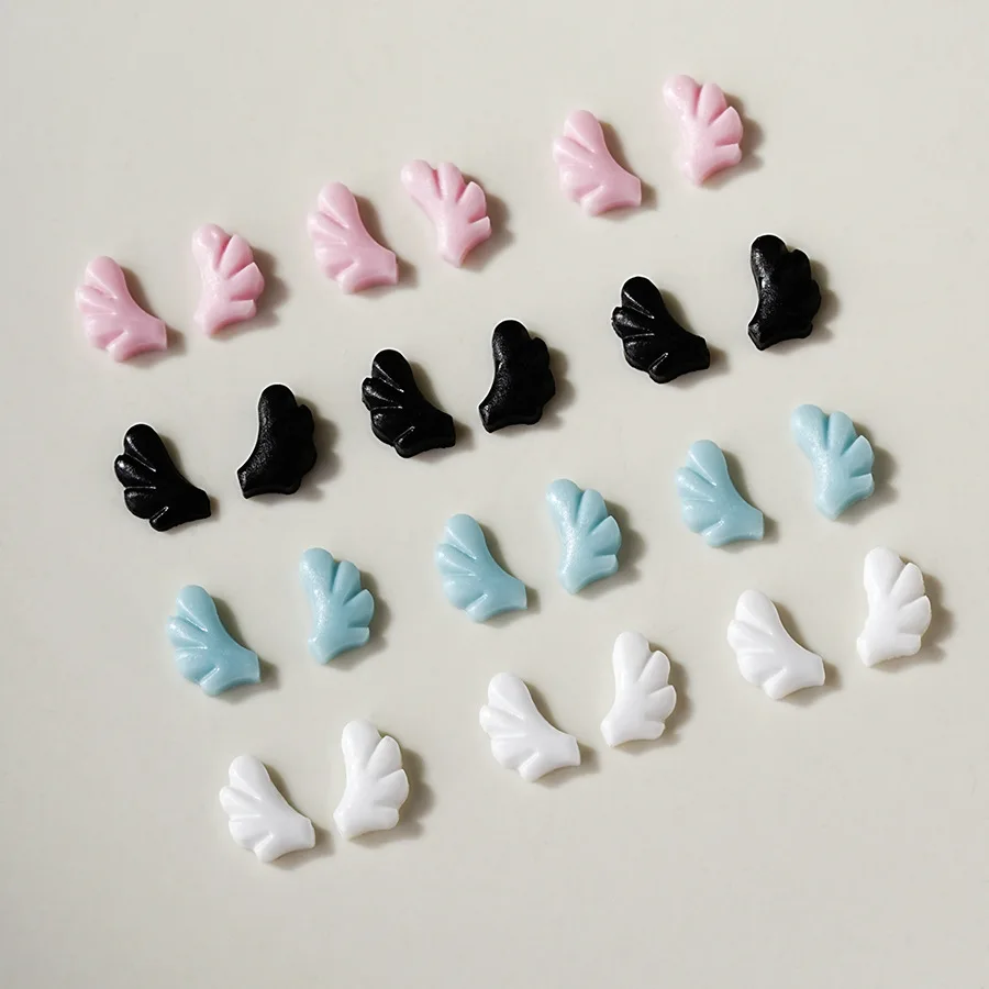 50 pz Nail Ali d'angelo Gioielli in resina 3D Polvere bianca Mini Nail Cahrms Fai da te Sinistra Destra Decorazioni per manicure Accessori Farfalla