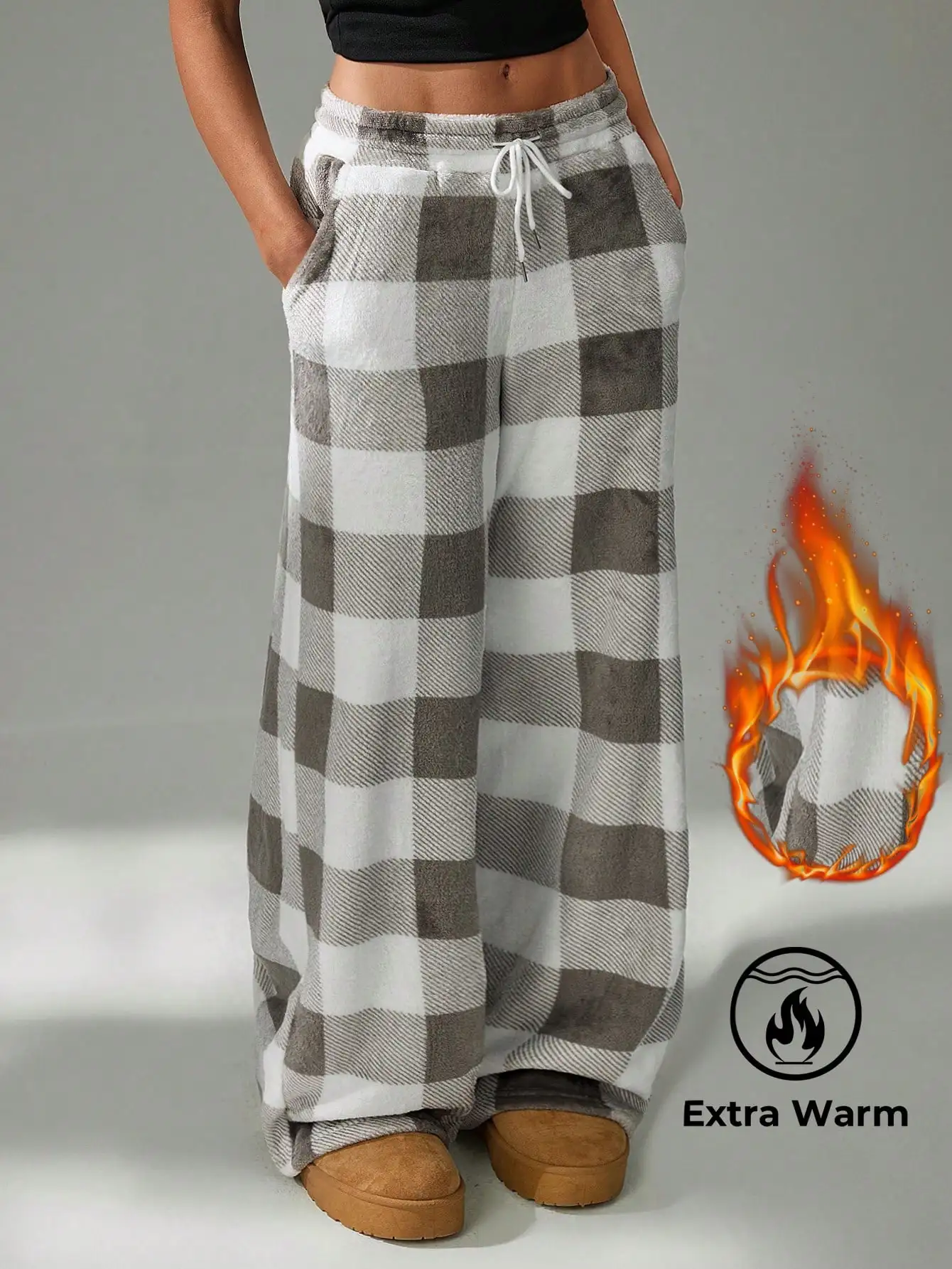 

Женские очень теплые широкие брюки в клетку с завязками на талии