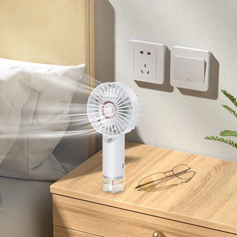 Humidifying Water Replenishing Handheld Spray Fan Fast Charging Convenient Desktop USB Charging Mini Handheld Fan 2025 New