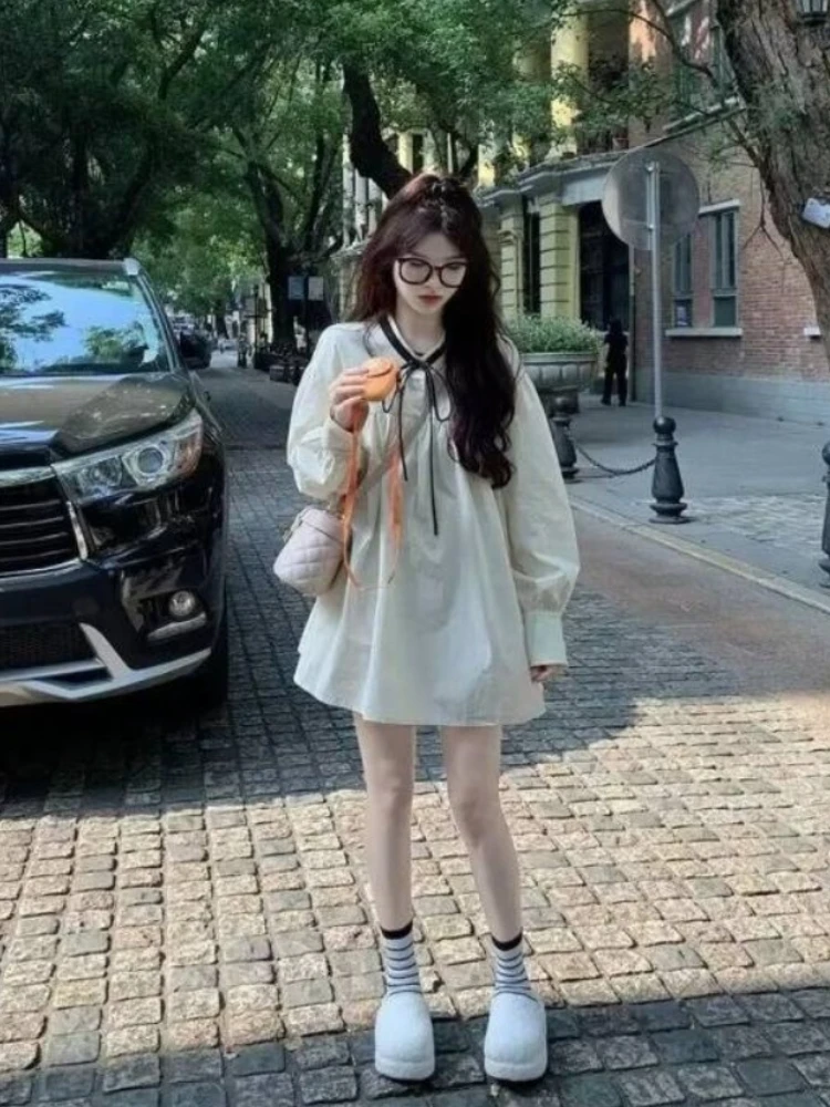 Abito francese vintage con maniche a palloncino Girly rilassato girocollo con fiocco e abito a trapezio smock Gonna silhouette mini bambola tono tè alla moda