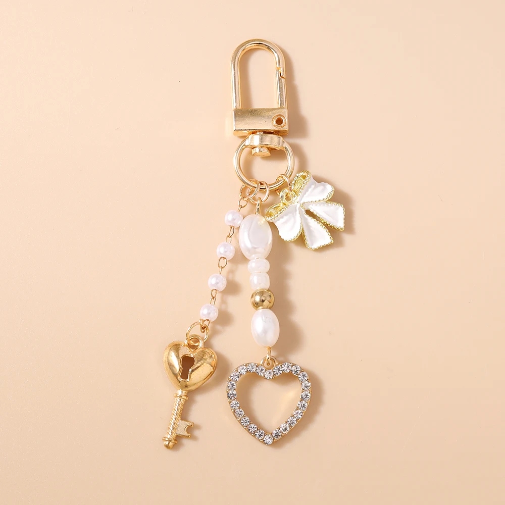 Aihua Niedlicher Y2K Metall-Schleifenherz-Schlüsselanhänger mit Perle für Damen und Mädchen, Handtaschenanhänger, DIY Handgemachter Schmuckzubehör – Detail 9