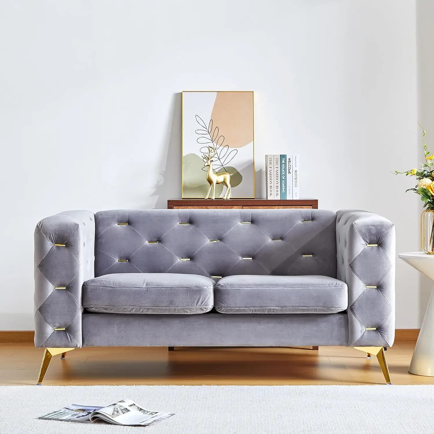 Modern 2-seater style velvet sofa with square armrests and metal cluster buttons, metal legs