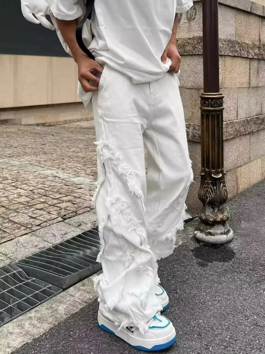 Amerykański styl erozji uszkodzenia surowe krawędzie dżinsy uliczne męskie styl Harajuku taniec hip-hopowy proste białe dżinsy damskie odzież Y2k