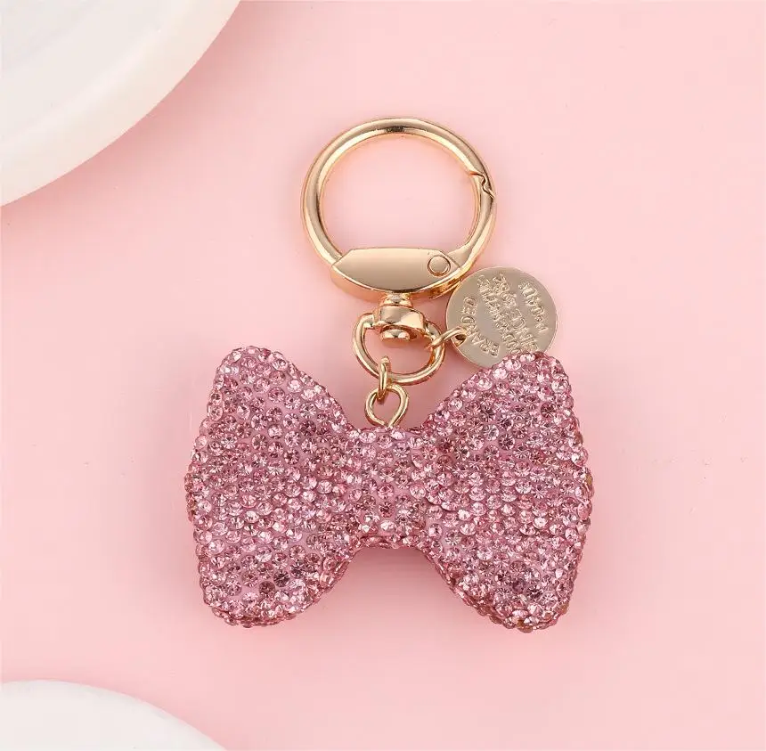 

Cute girl bow keychain, a unique light luxury car keychain with both sides fully decorated with butterflies