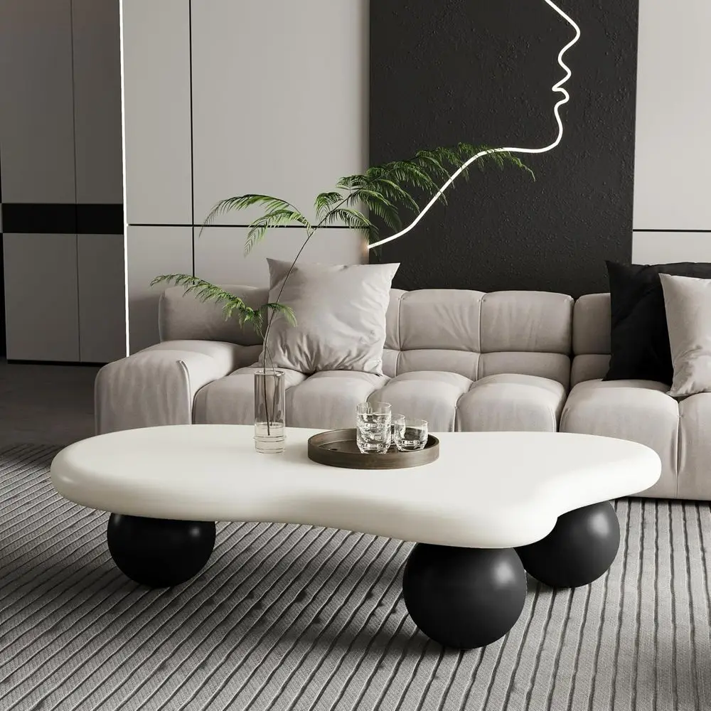 

Cloud-Inspired 40 Round Coffee Table with 3 Unique Legs, Ideal for Small Living Spaces