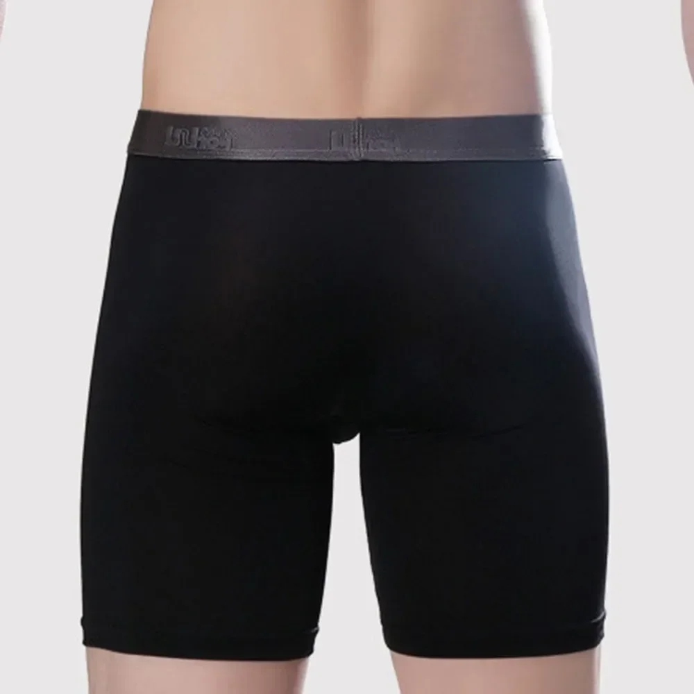 Pantalones cortos largos de nailon sexis para hombre, ropa interior con bolsa, bragas suaves convexas en U, calzoncillos deportivos, pantalones cortos esculpidos