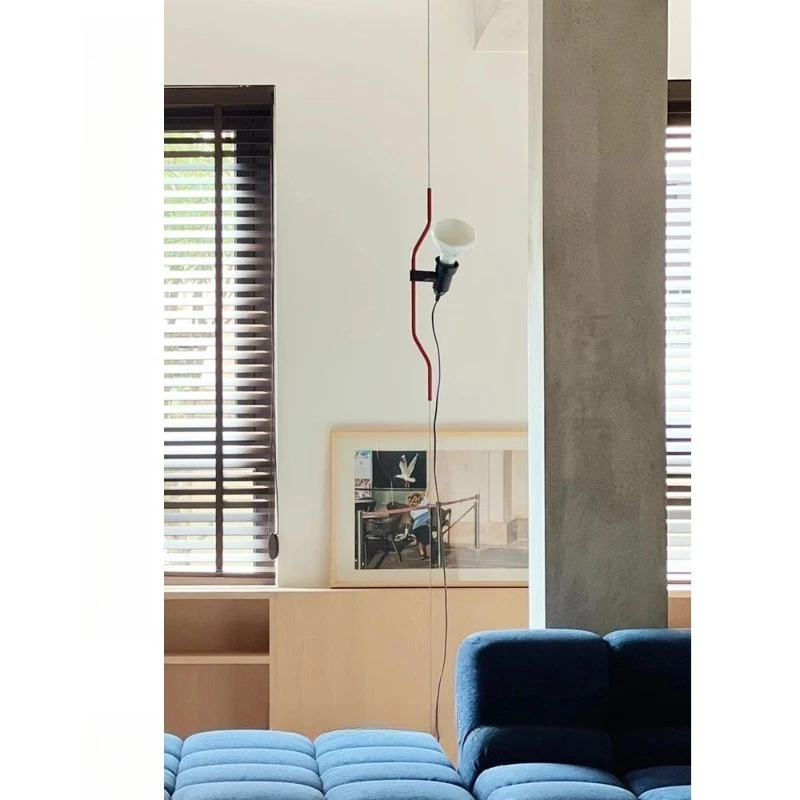 Minimalist floor lamp next to the sofa in the living room, bedside chandelier in the bedroom