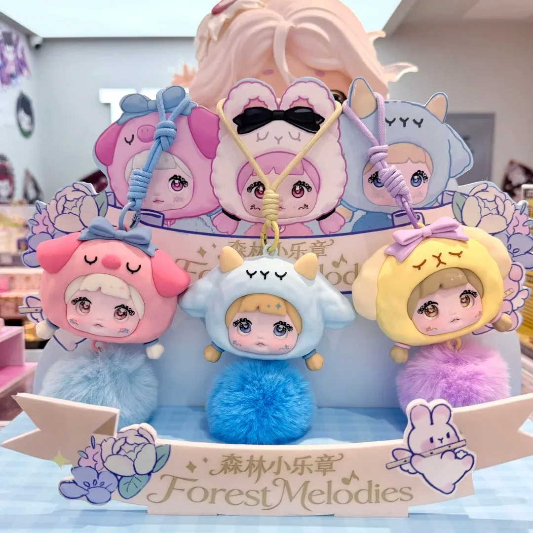 

Nommi Forest Melodies Cute Vinyl Face Doll Pom Pom Bag Pendant Headphone Case Blind Box Mystery Toys Keychain Girl Gifts