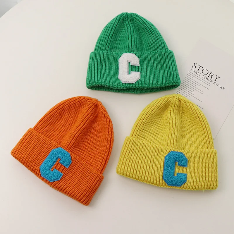 C letter knitted hat Warm boys and girls Korean autumn and winter thickened wool hat candy color simple ear protection hat