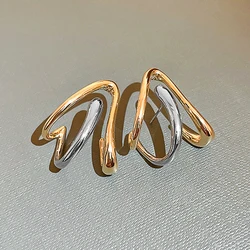 Huitan-pendientes de Metal de dos tonos para mujer, Piercing de oreja Simple y elegante, accesorios modernos para niñas, joyería de declaración de uso diario