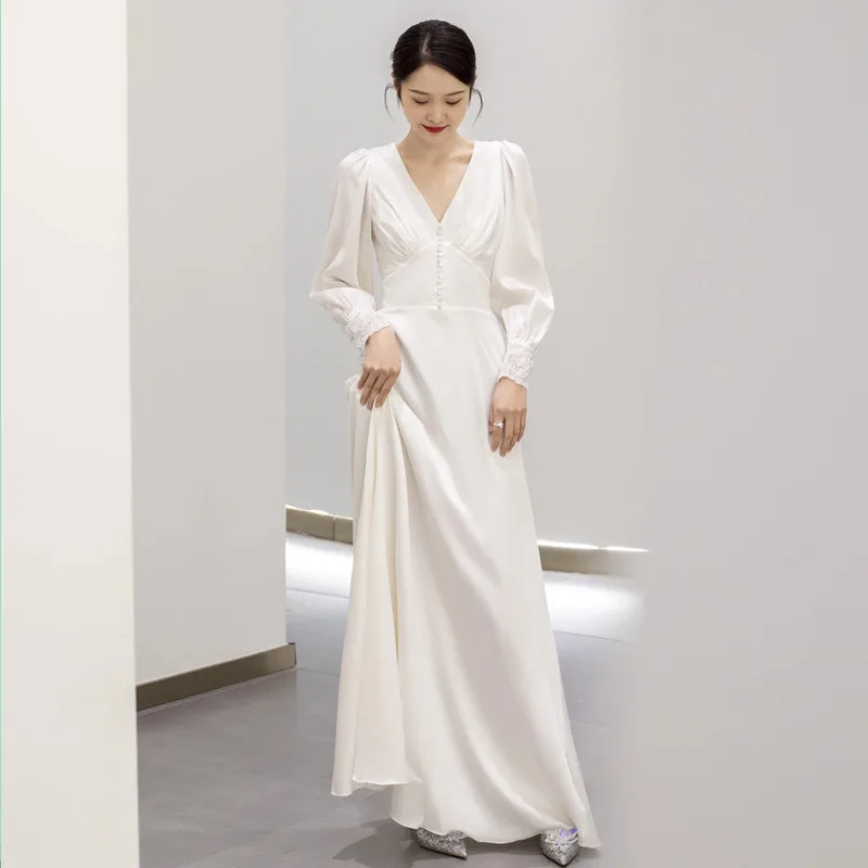 French light wedding dress long-sleeved v-neck simple travel photo white thin Korean bride