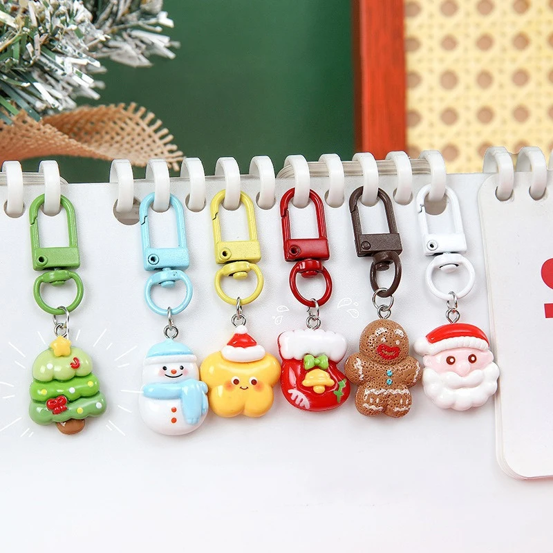 น่ารักคริสต์มาสเรซิ่นพวงกุญแจจี้ DIY การ์ตูน Santa Snowman พวงกุญแจร้อนขายกระเป๋า Charm กระเป๋าเป้สะพายหลังตกแต่งของขวัญ