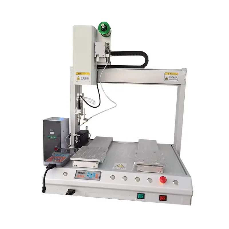 Saldatrice per assemblaggio elettronico con pendente portatile per insegnare e due stazioni