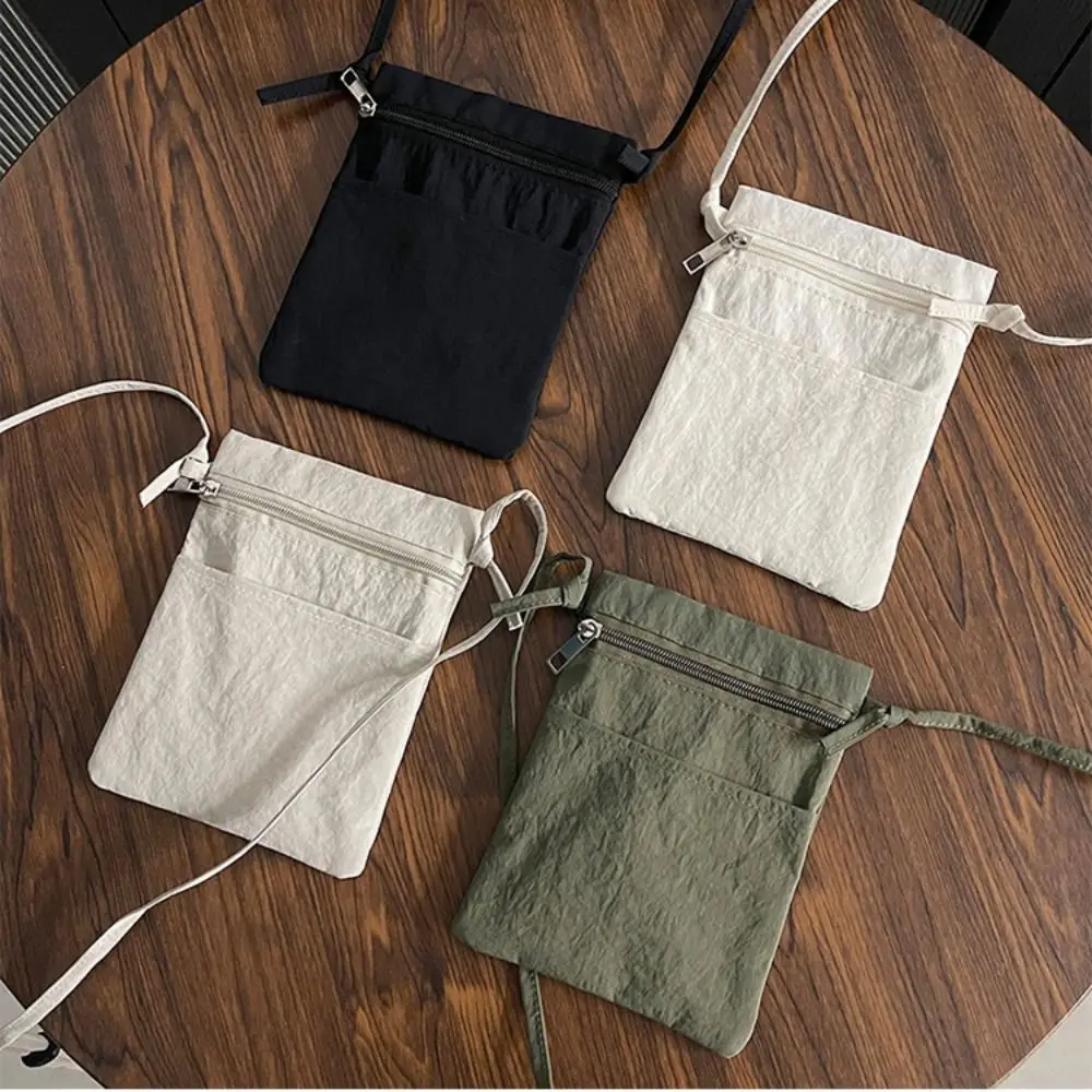 Minimalist Portable Cell Phone Bag Nylon Fabric Lightweight Shoulder Bag Solid Color Thin Strap Phone Purse for Men and Women