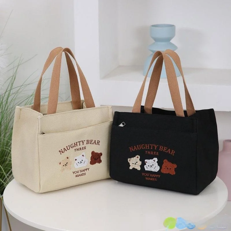 

Новая стильная портативная сумка-ланчбокс из холщовой ткани для улицы, простой дизайн, подходит для офисных работников и студентов.