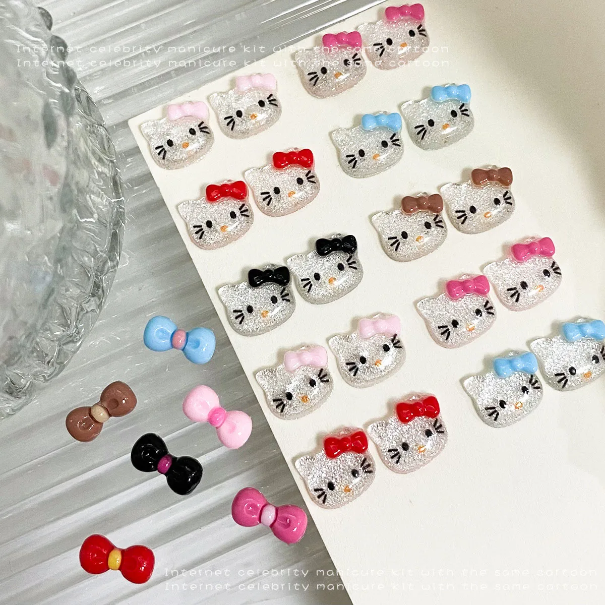 12 Siatek 3D Letnie Kokardki Hello Kitty Ozdoby do Paznokci Różowe/Czerwone/Niebieskie/Czarne/Brązowe Lodowe Przezroczyste Akcesoria do Paznokci z Kocimi Uszkami Artykuły do Zdobienia Paznokci