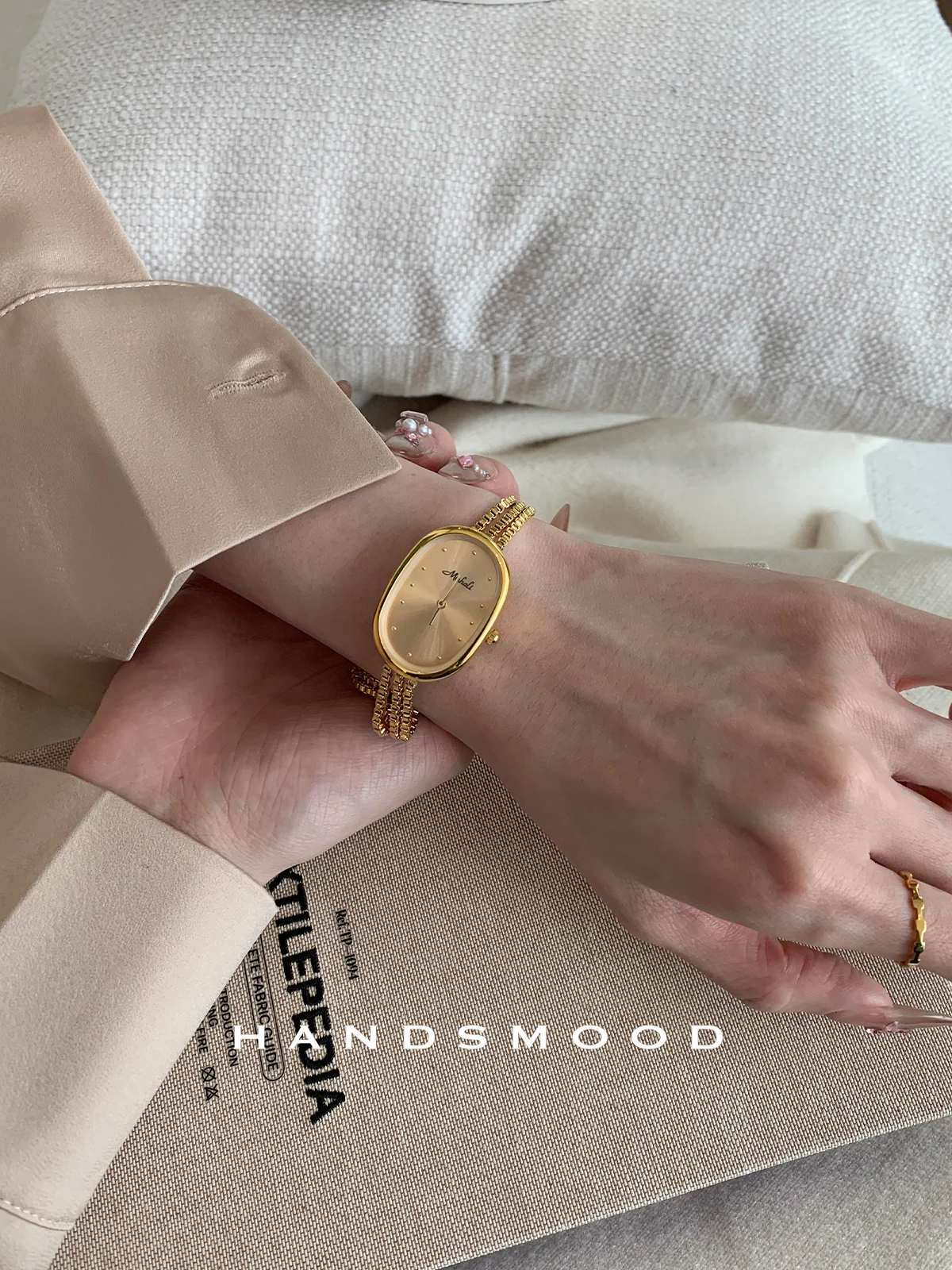 Luxury women's watch, high-end gold oval dial, tassel chain design belt buckle, ladies quartz watch, women's gift, women's watch