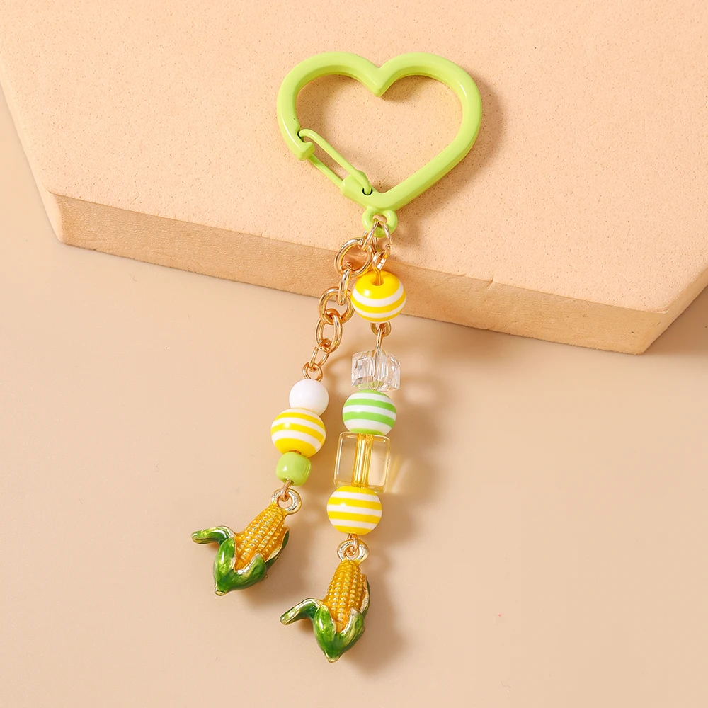 Aihua Emaille-Schlüsselanhänger mit Pistazien-, Wassermelonen- und Maismotiven, Niedlicher Frucht-Schlüsselring, Autoschlüsselhalter, Handtaschenanhänger, Deko-DIY-Schmuckgeschenke – Detail 5