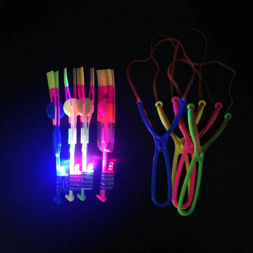10Pcs Funny Luminous Slingshot Flying Arrow LED Light Up Flashing Dragonfly Glow For Kids Party Toys Gift Color Random