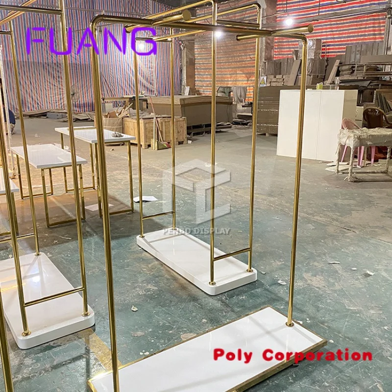 Custom  Modern Style Golden Stainless Steel Garment Clothing Display Racks Standing For Clothes Store