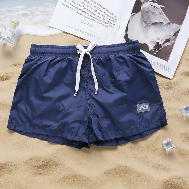 

2026Beach new quick-drying men's and women's shorts breathable casual beach sports loose couple swimming trunks tide AD4-M356