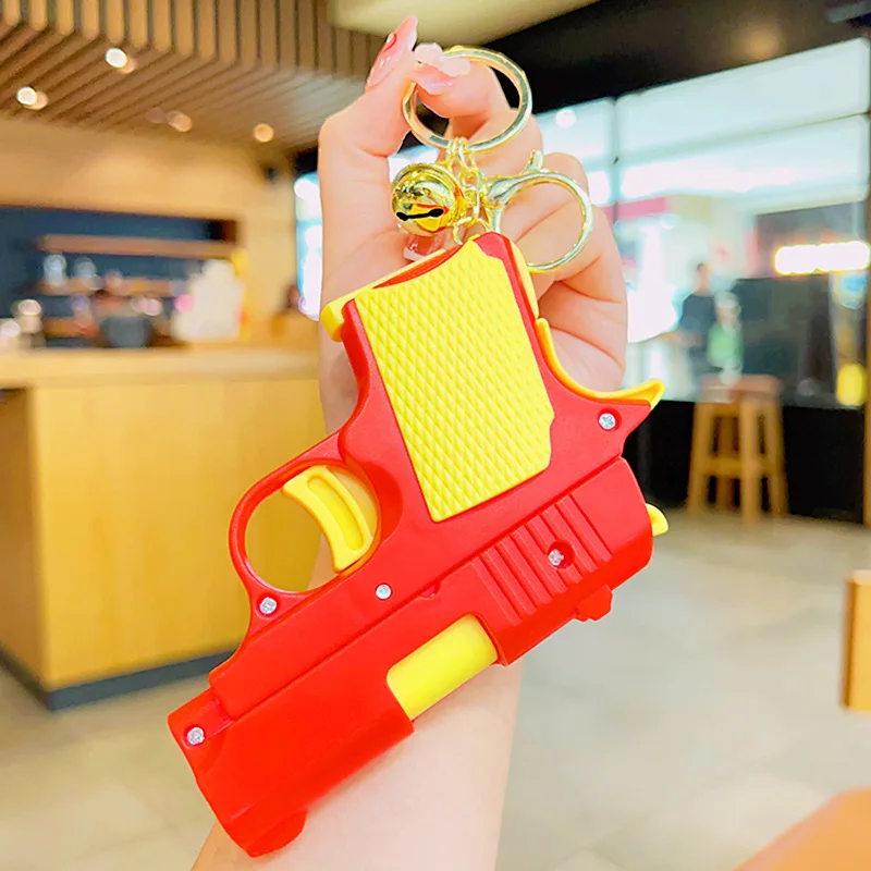 Decompression Carrot Gun Backpack Keychain Small Accessories Creative Cartoon Pendant Keychain Jewelry Bag