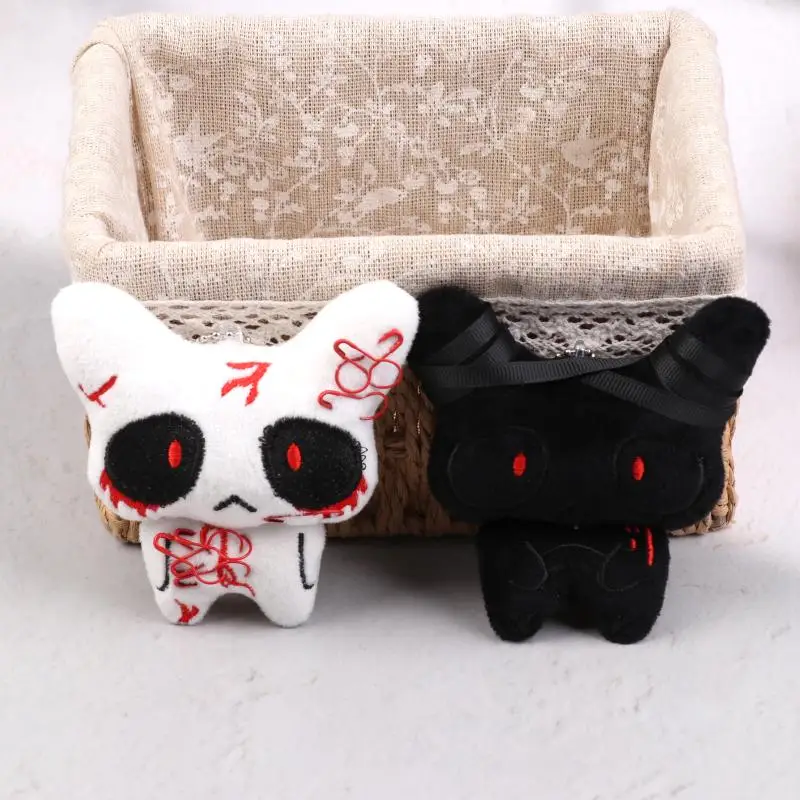 1 paio di portachiavi in peluche fantasma rotto ferito bianco nero Halloween Cartoon bambola di pezza portachiavi ciondolo borsa decorazione di coppia