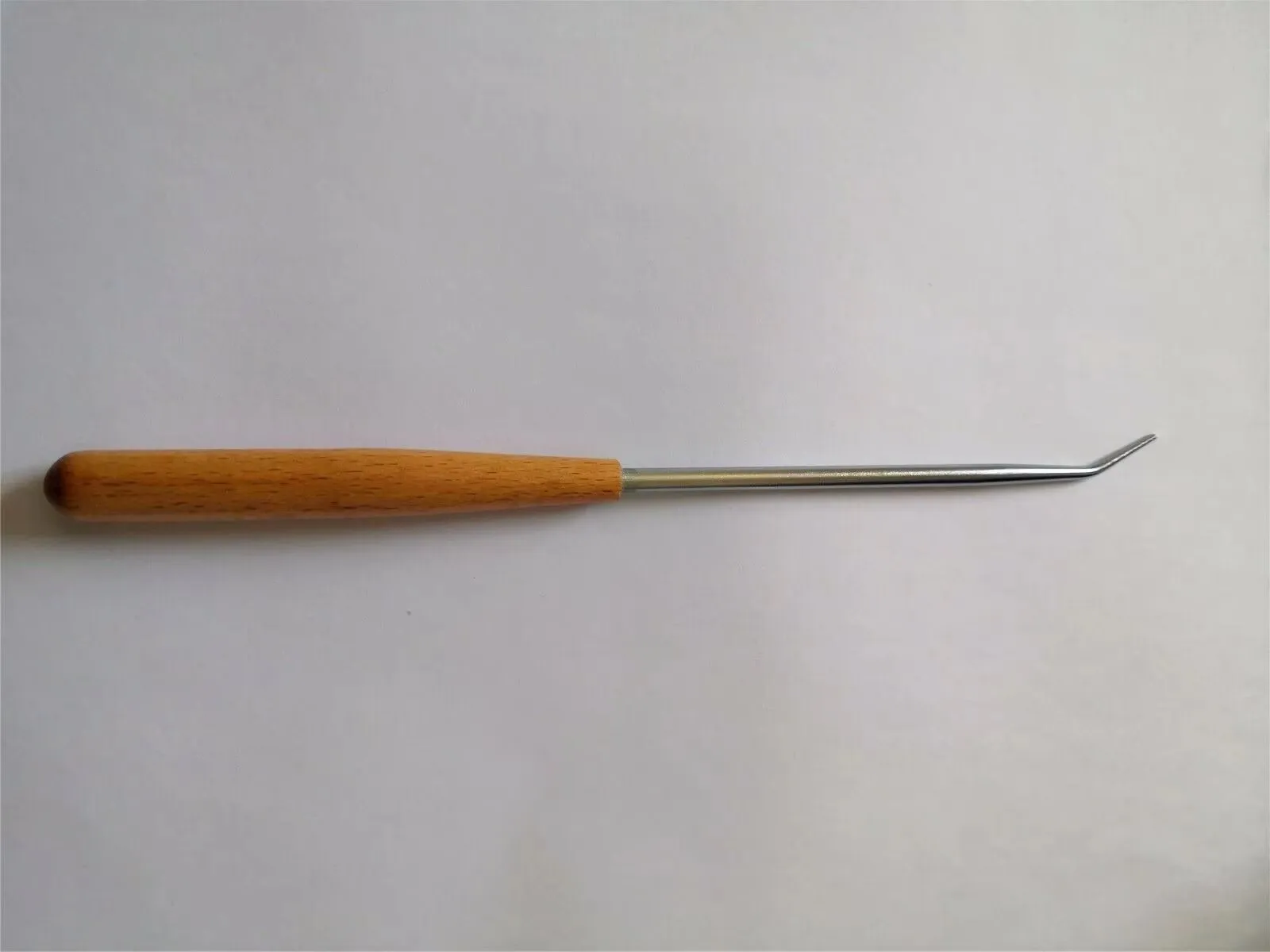 

Piano tools, pointed capstan screw wrench.With wooden handle