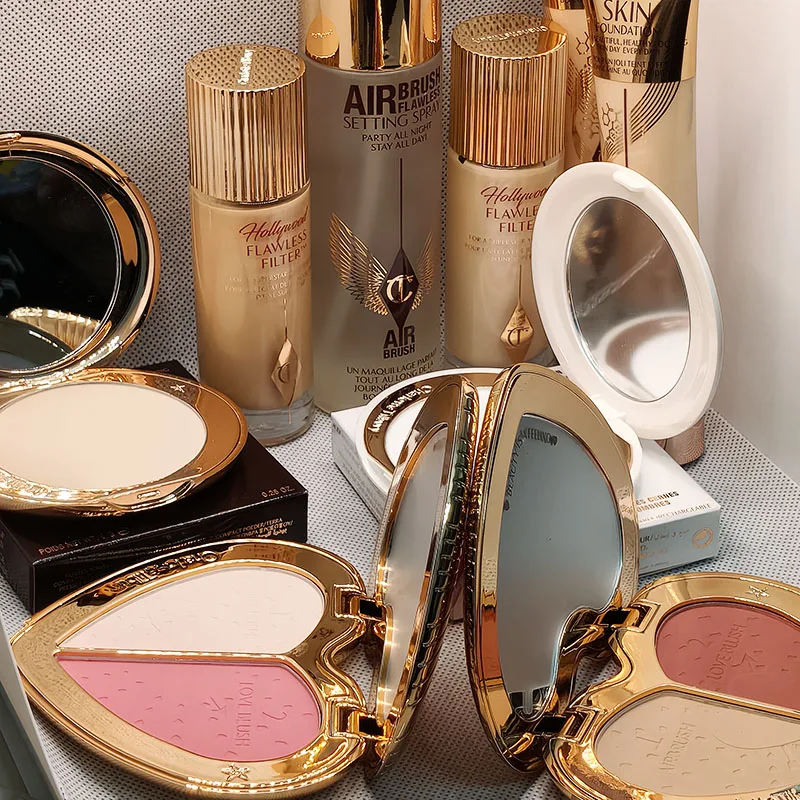Charlotte Tilbury – Nouveau Fard à joues en poudre bicolore en forme de cœur, Spray fixateur, Poudre matifiante, Stylo-coussin d'air cosmétique