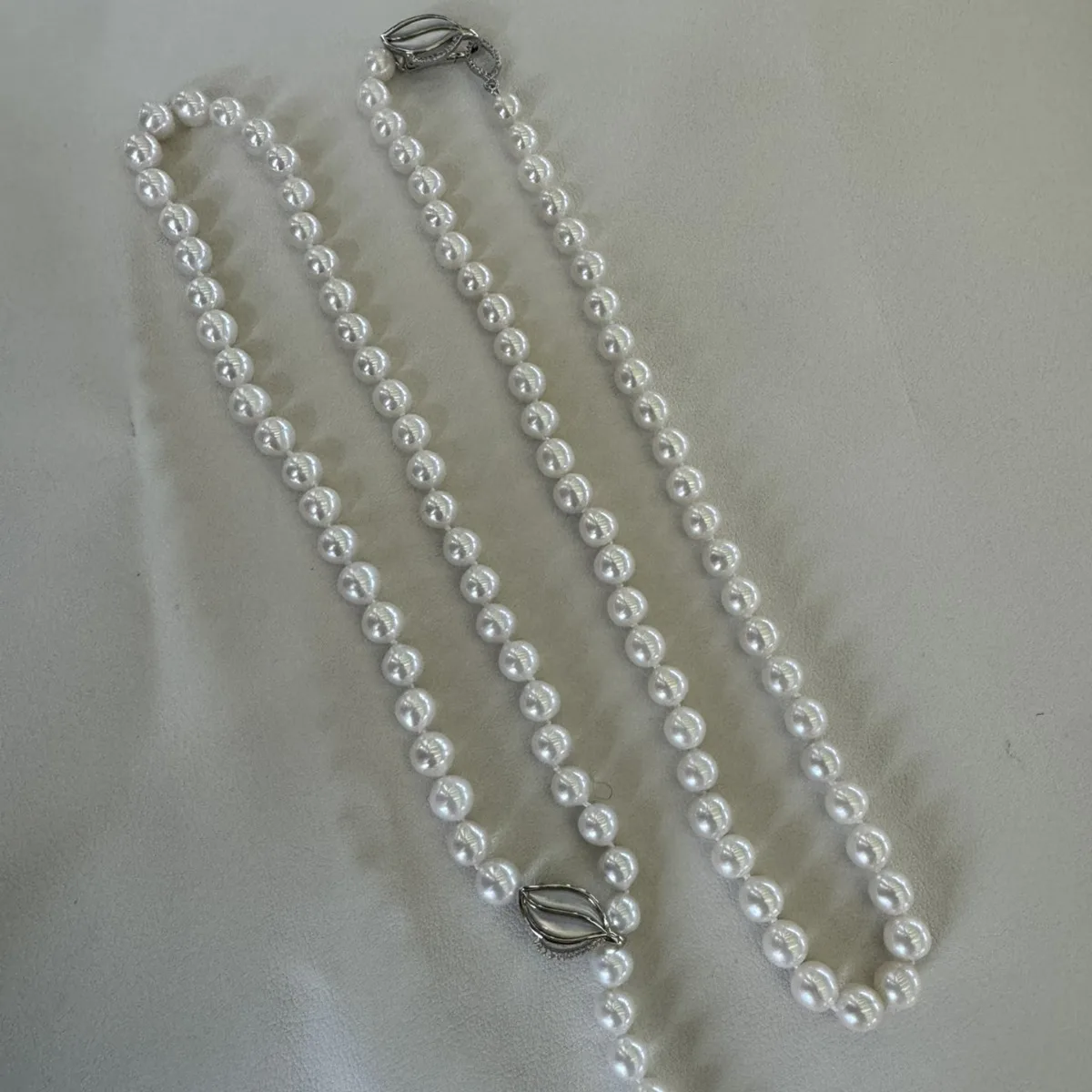

Ожерелье из натурального пресноводного жемчуга диаметром 7–8 мм, блестящая застежка из перламутра с гладкой кожей из сплава с высоким блеском
