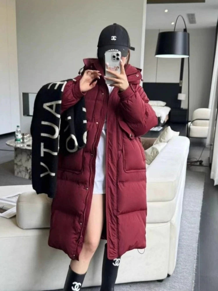 Piumino lungo invernale 2025New Coreano di alta qualità con cappuccio sciolto resistente al freddo Parka da donna addensare caldo piumino d'anatra bianco