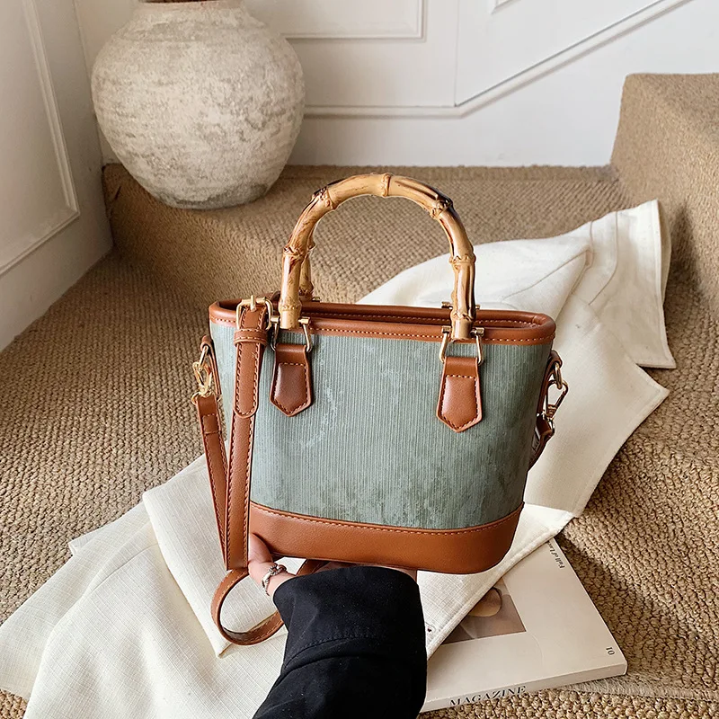 

Fashionable and Stylish Bamboo Tote Bag 2026 New Color Blocked Bucket Bag for Women, High-end Single Shoulder Crossbody Bag