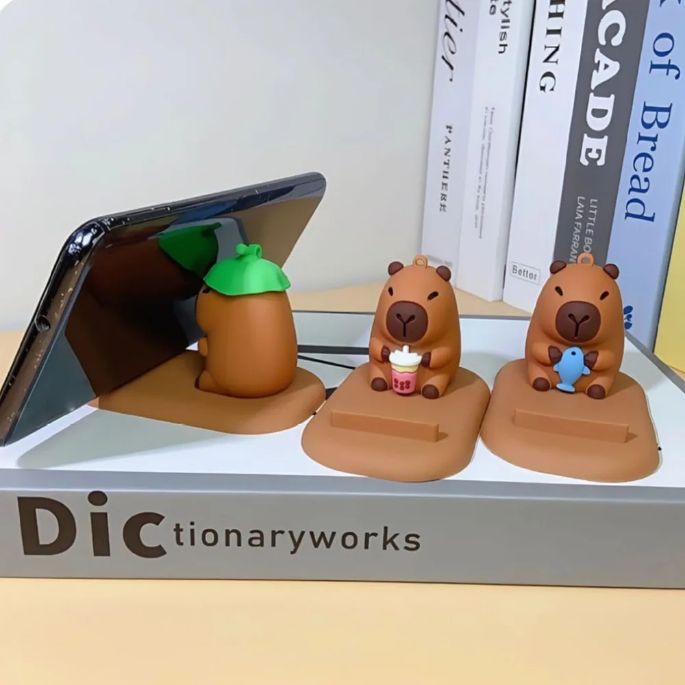 

Черепаха Капибара Держатель для телефона Фигурка Модель Поддержка Капибара Подставка для мобильного телефона Настольный декор ПВХ Кукла Капибара Кронштейн для мобильного телефона